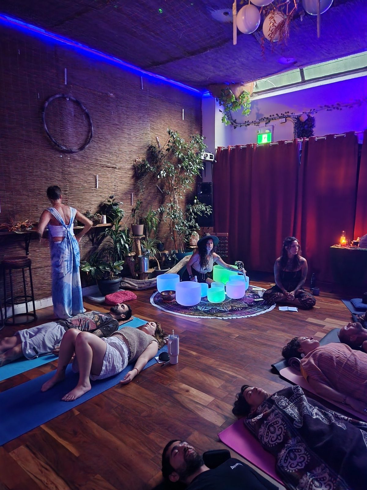 Guests resting during an intimate Bohem Dreme sound journey gathering